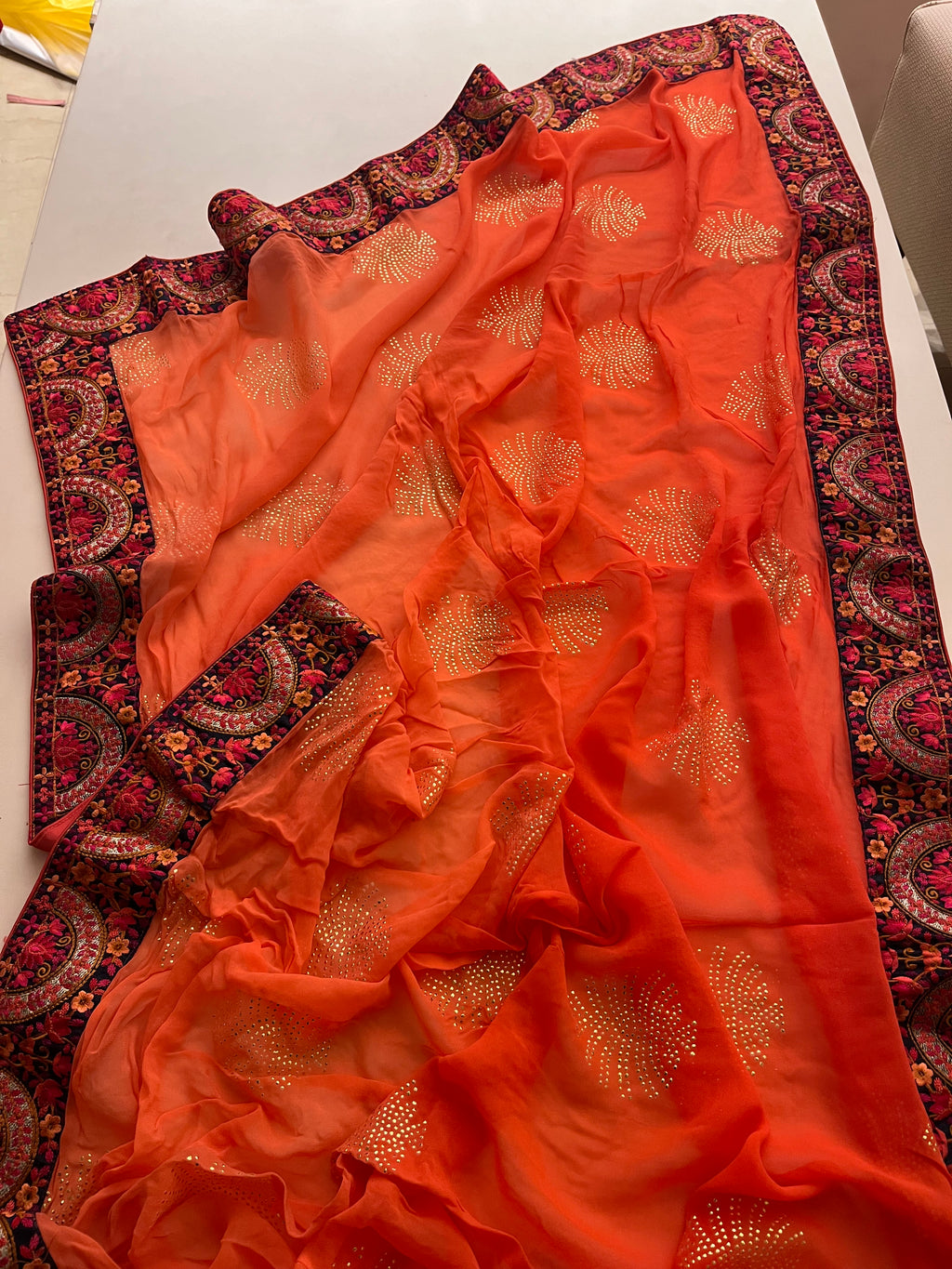 Tangerine Ebroidery Georgette saree