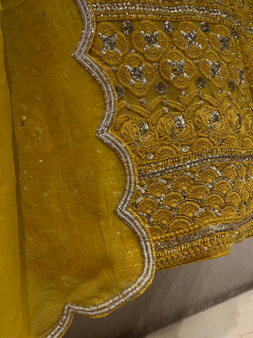 Mustard yellow Lucknowi lehenga set