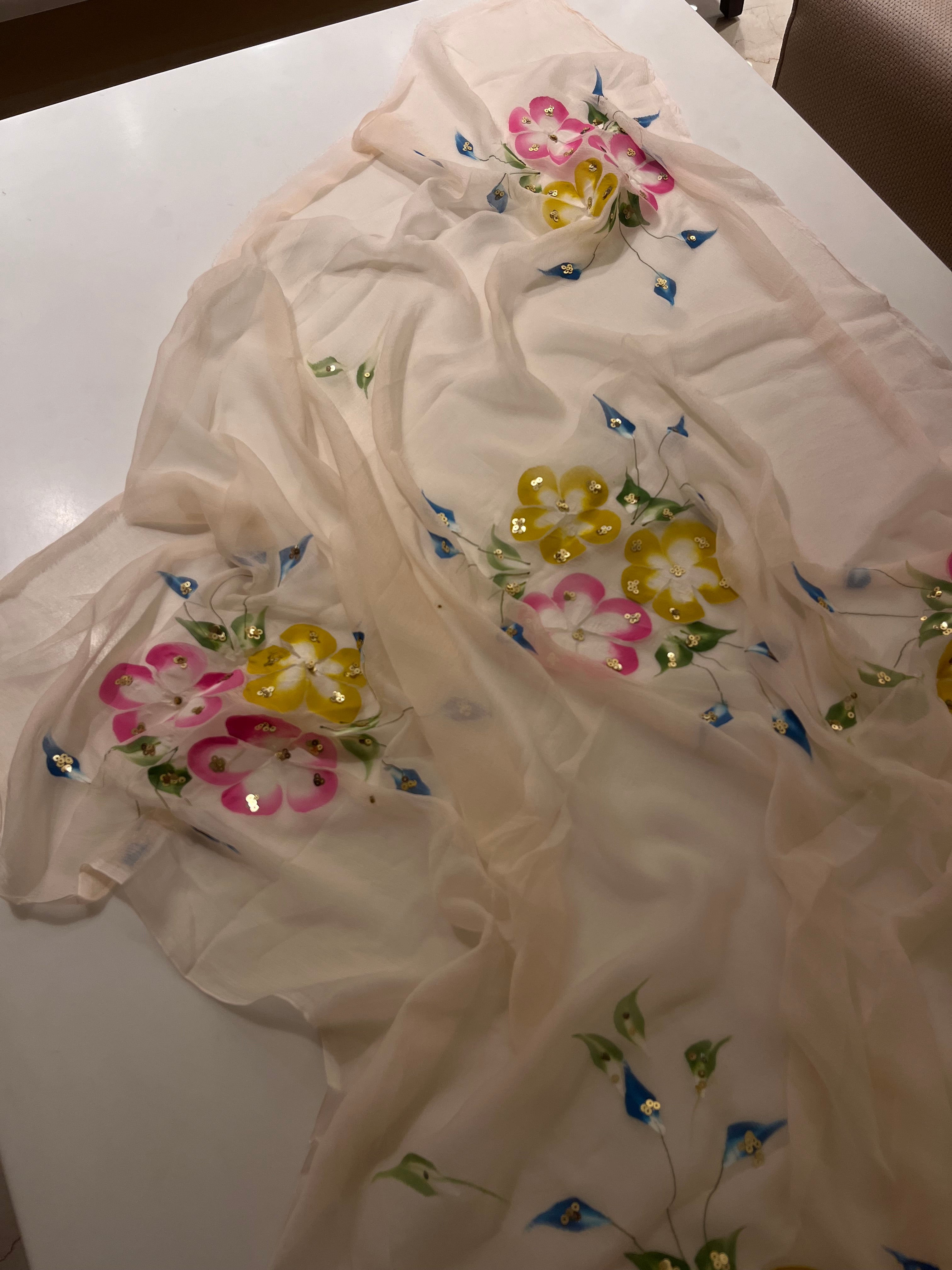 Handpainted Peach flora saree