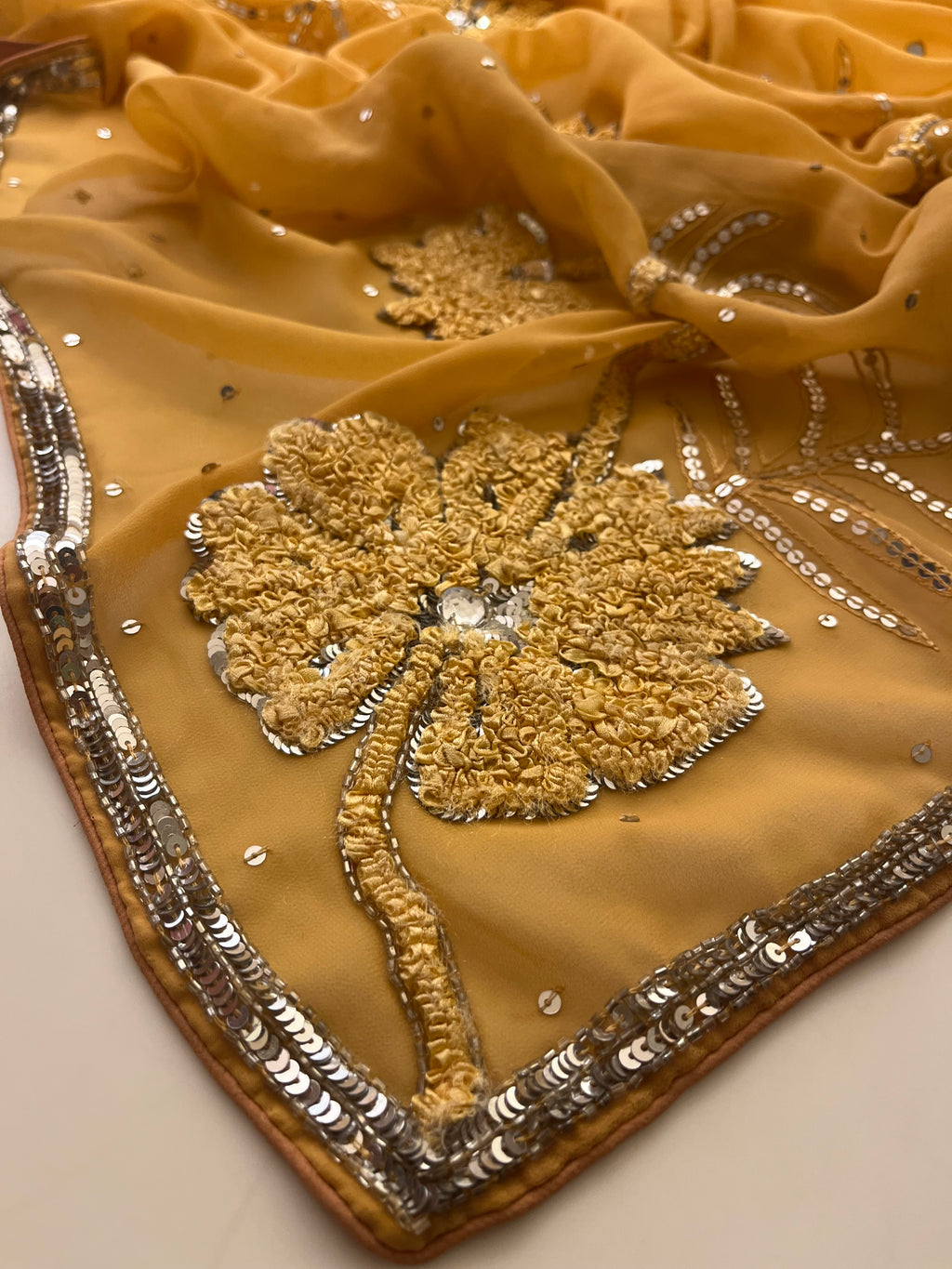 yellow flower georgette saree