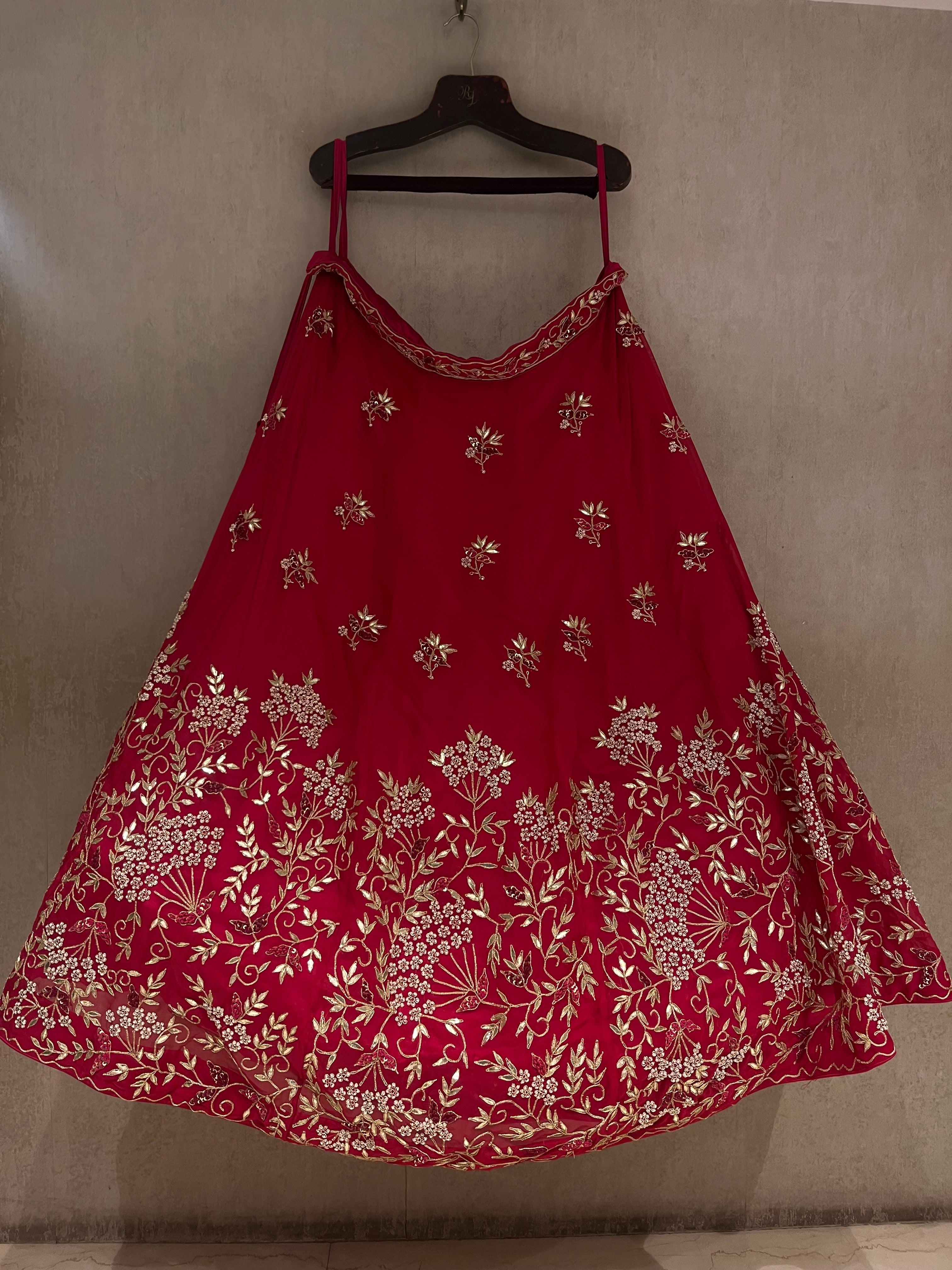 Meera in Raani pink lehenga set