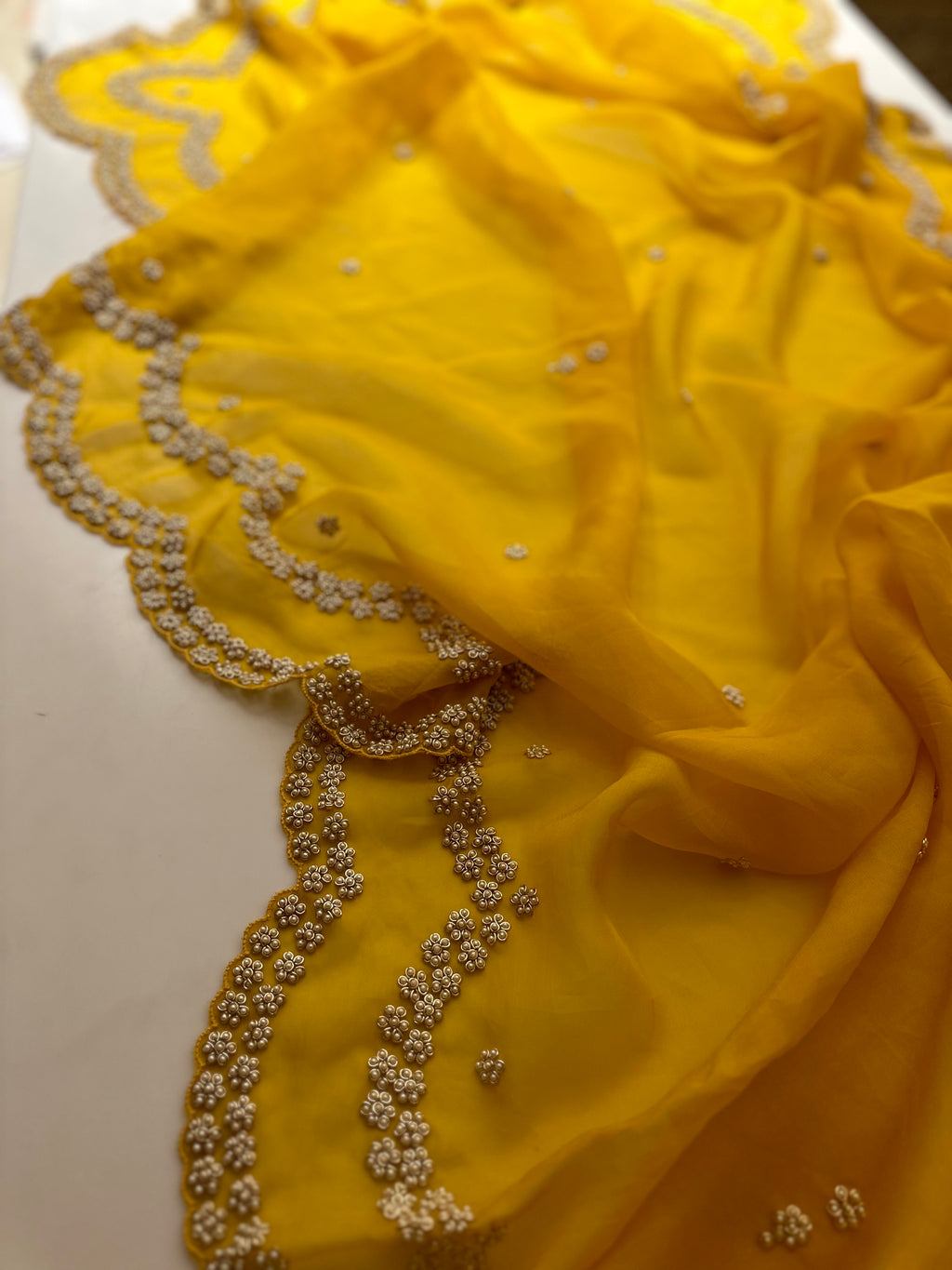 “Radha” Haldi Yellow Pearl Saree