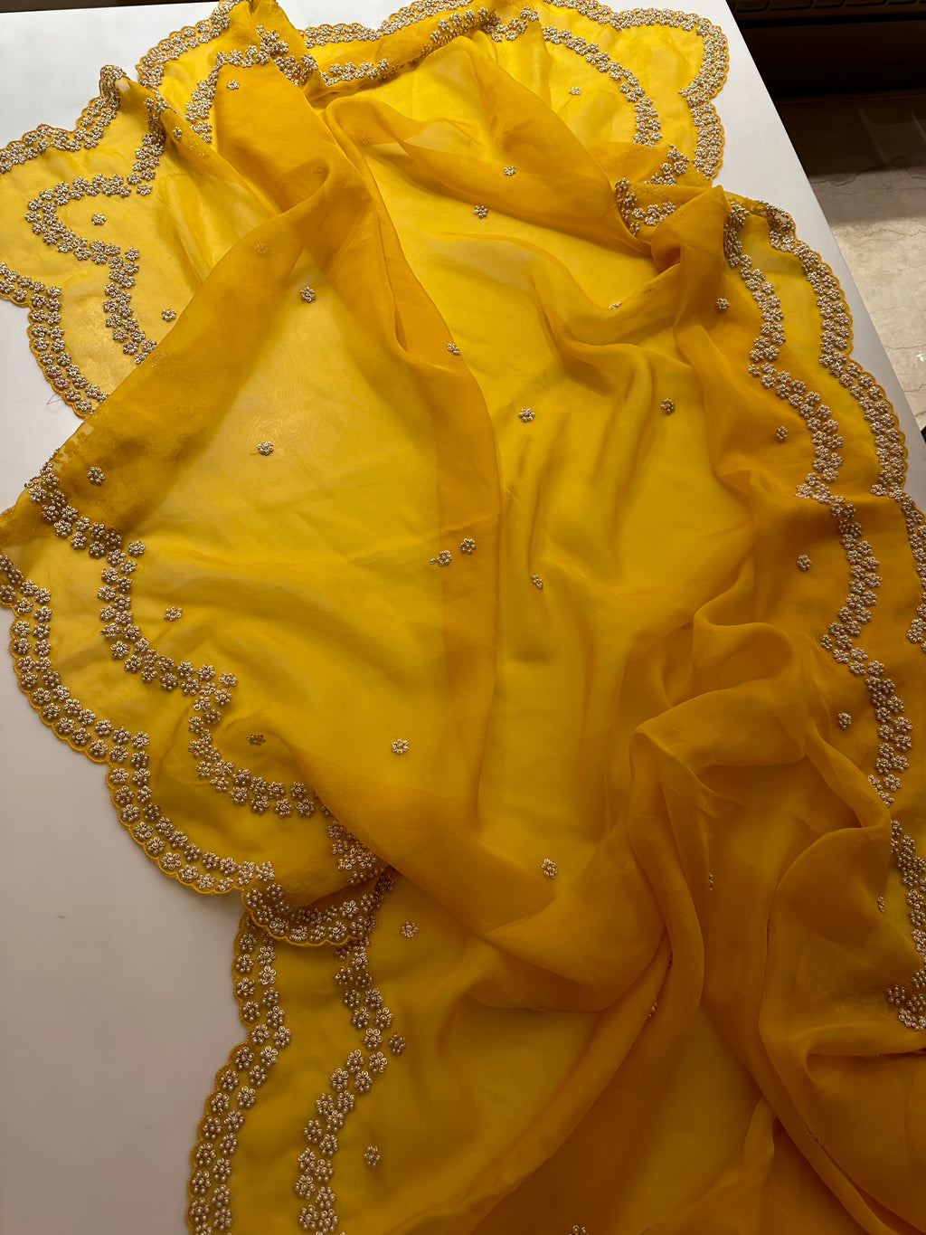“Radha” Haldi Yellow Pearl Saree