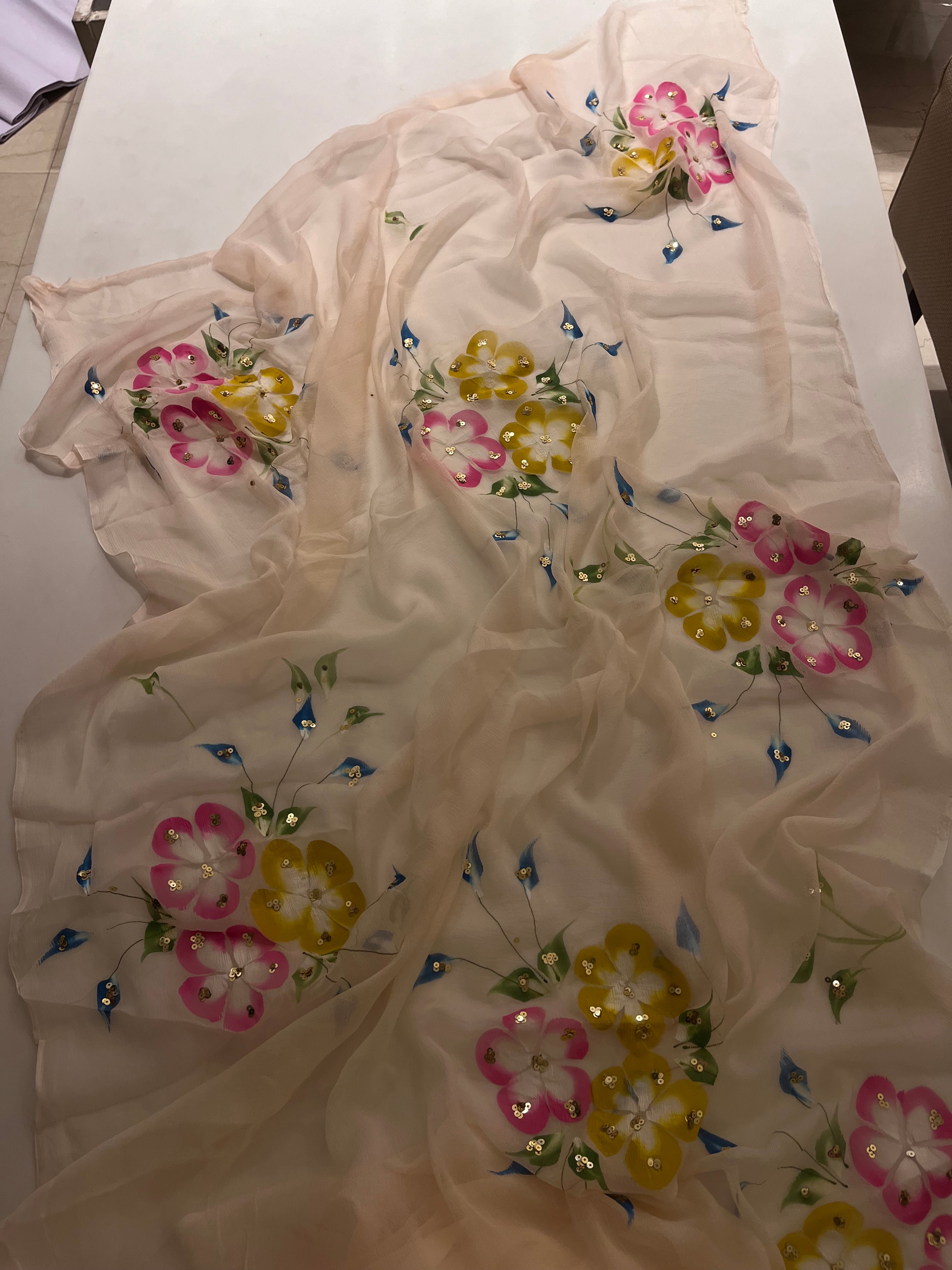 Handpainted Peach flora saree