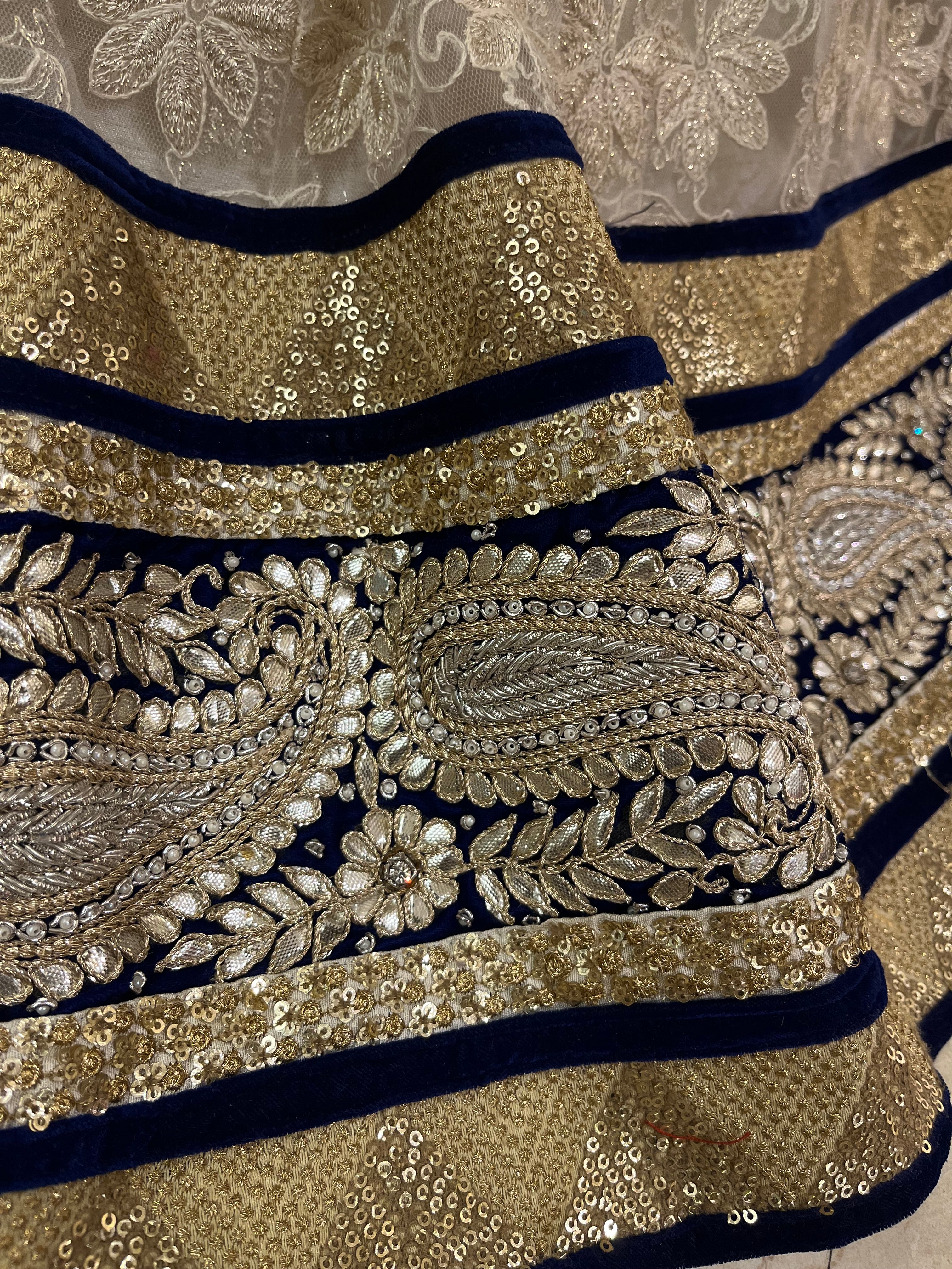 Ivory Net Lehenga Set