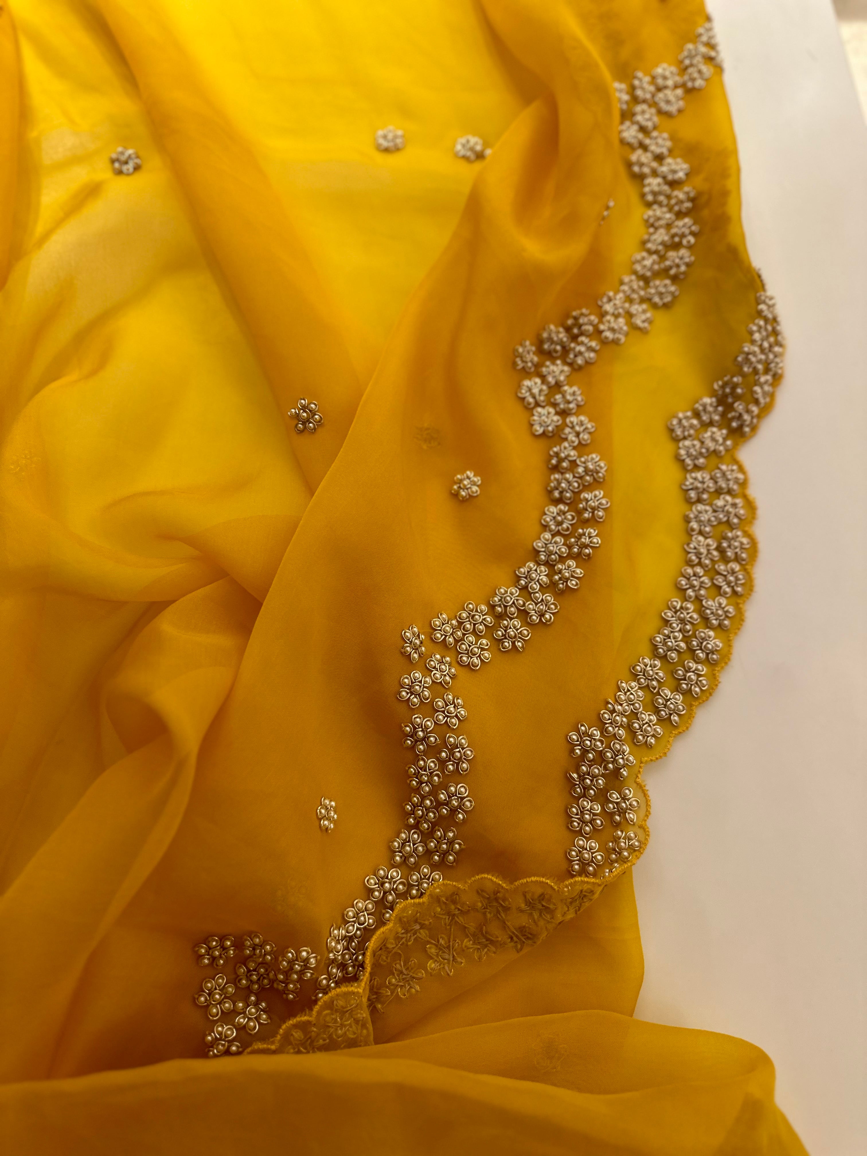 “Radha” Haldi Yellow Pearl Saree