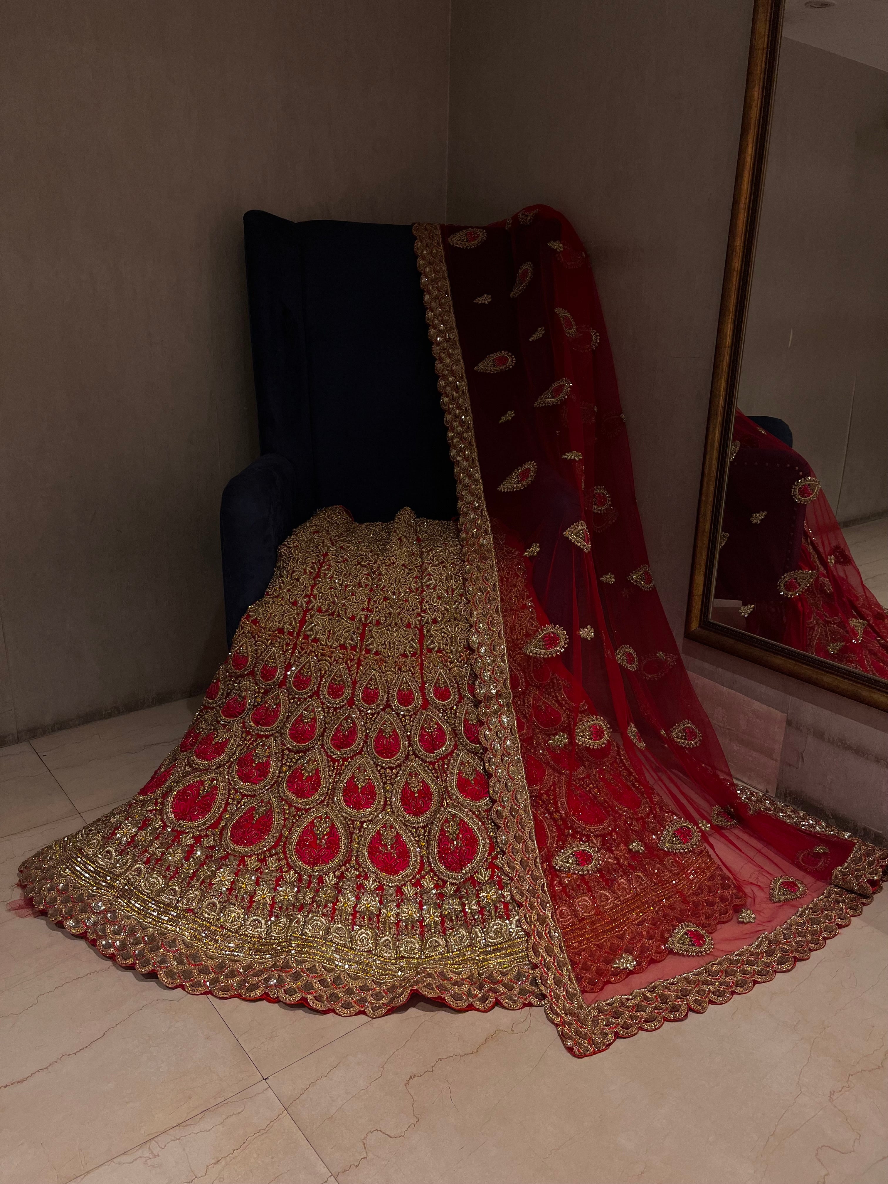 Red and Golden heavy stone lehenga Set