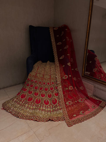 Red and Golden heavy stone lehenga Set