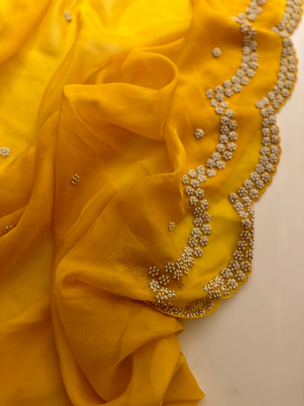 “Radha” Haldi Yellow Pearl Saree
