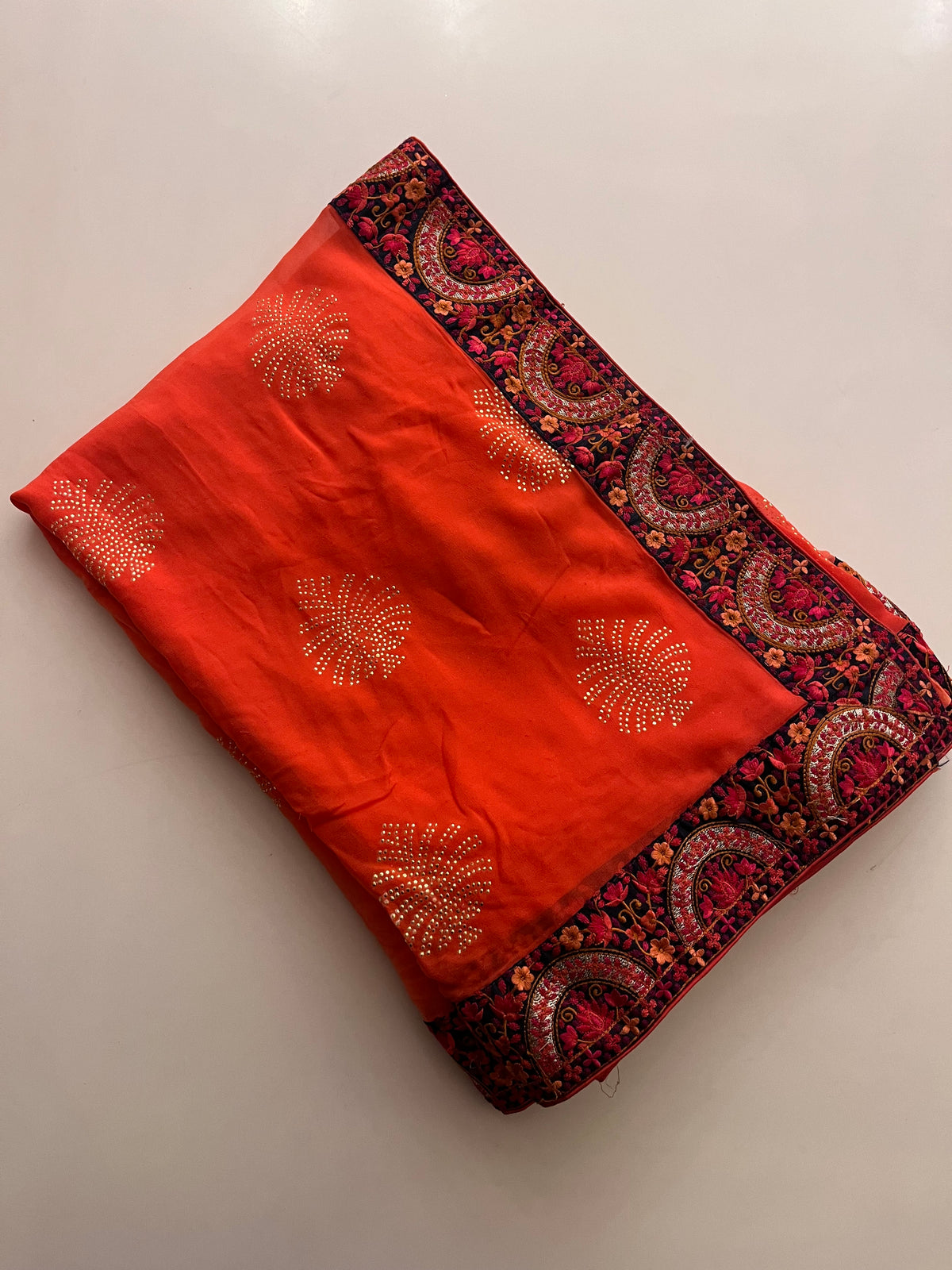 Tangerine Ebroidery Georgette saree