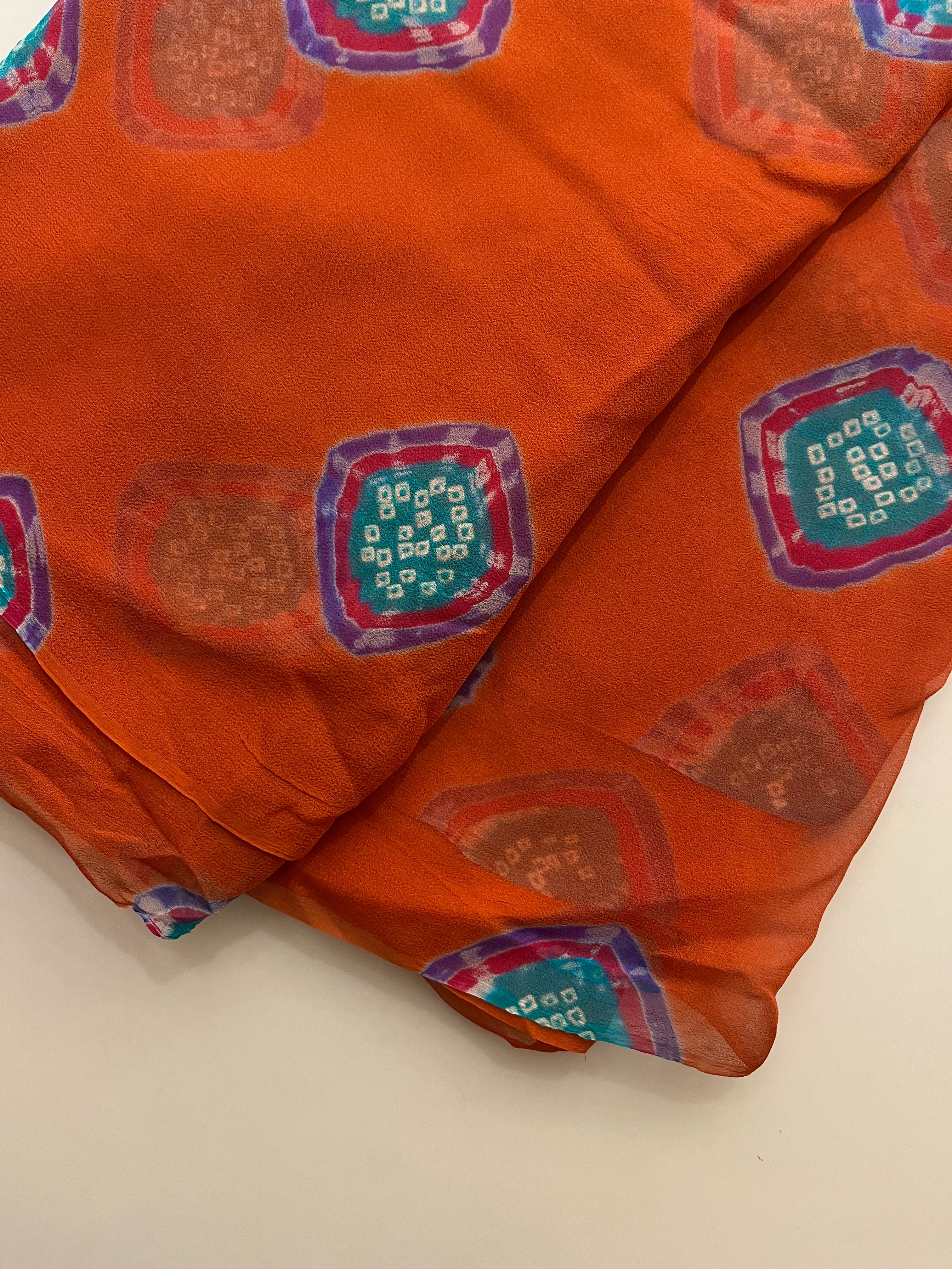 pure chiffon orange bandej saree
