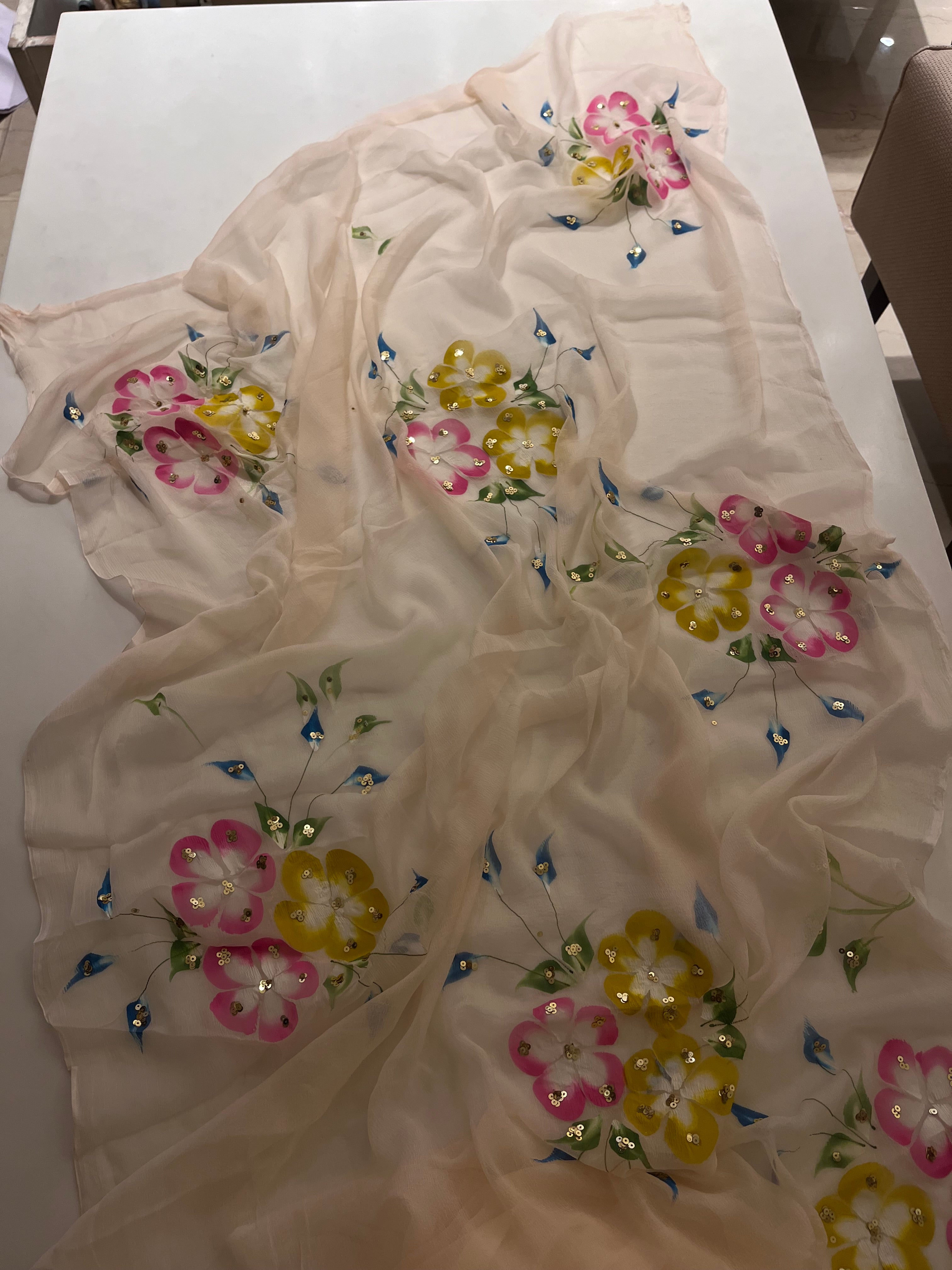 Handpainted Peach flora saree