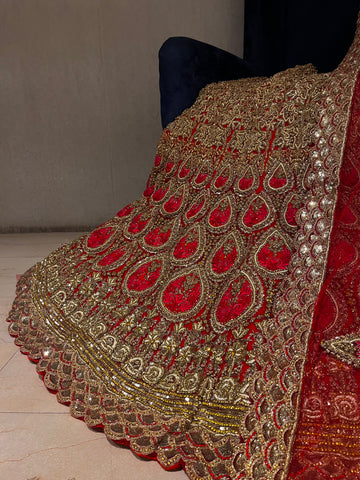 Red and Golden heavy stone lehenga Set