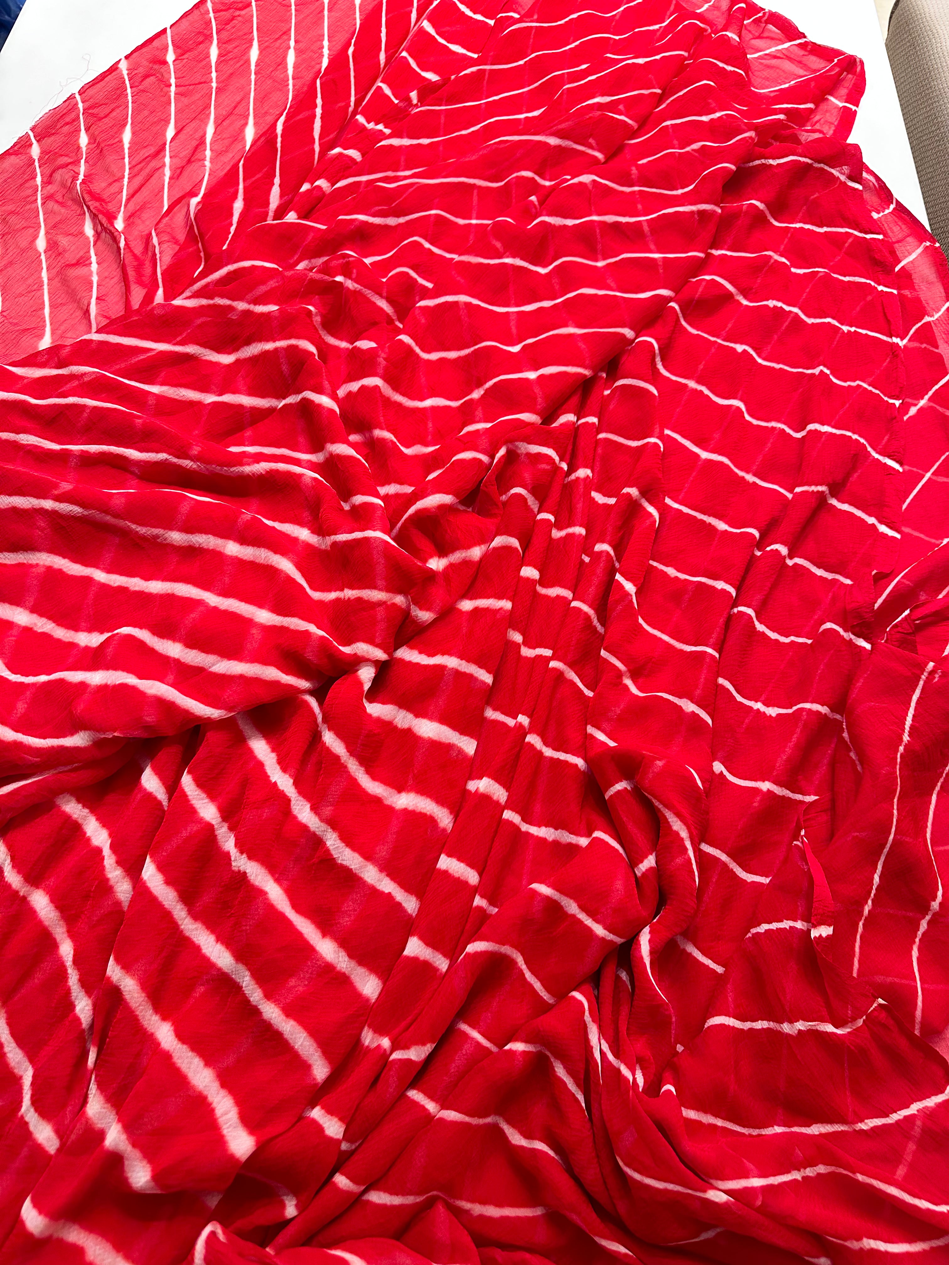 Red Lehriya saree