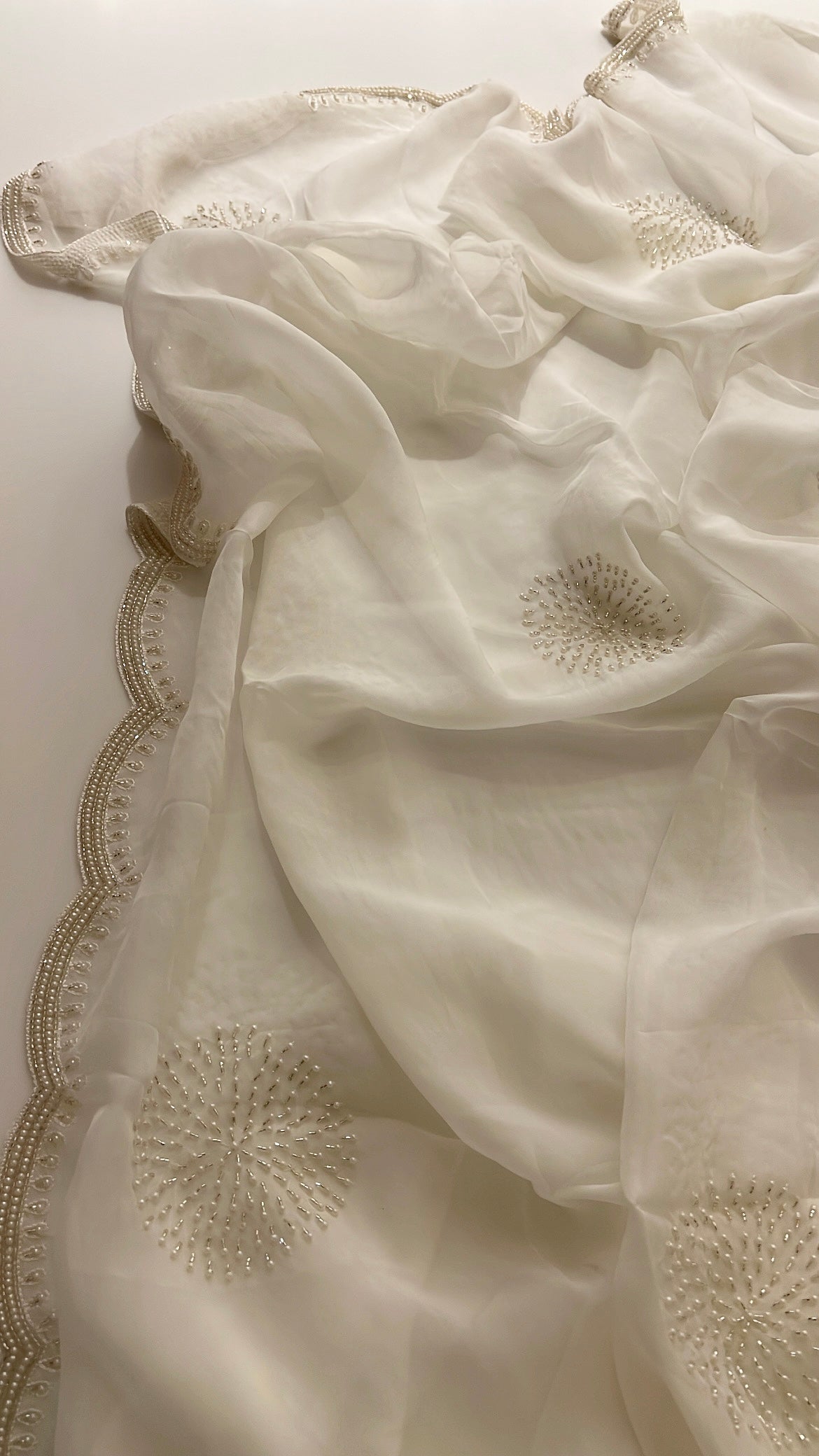 Ivory pearl organza saree