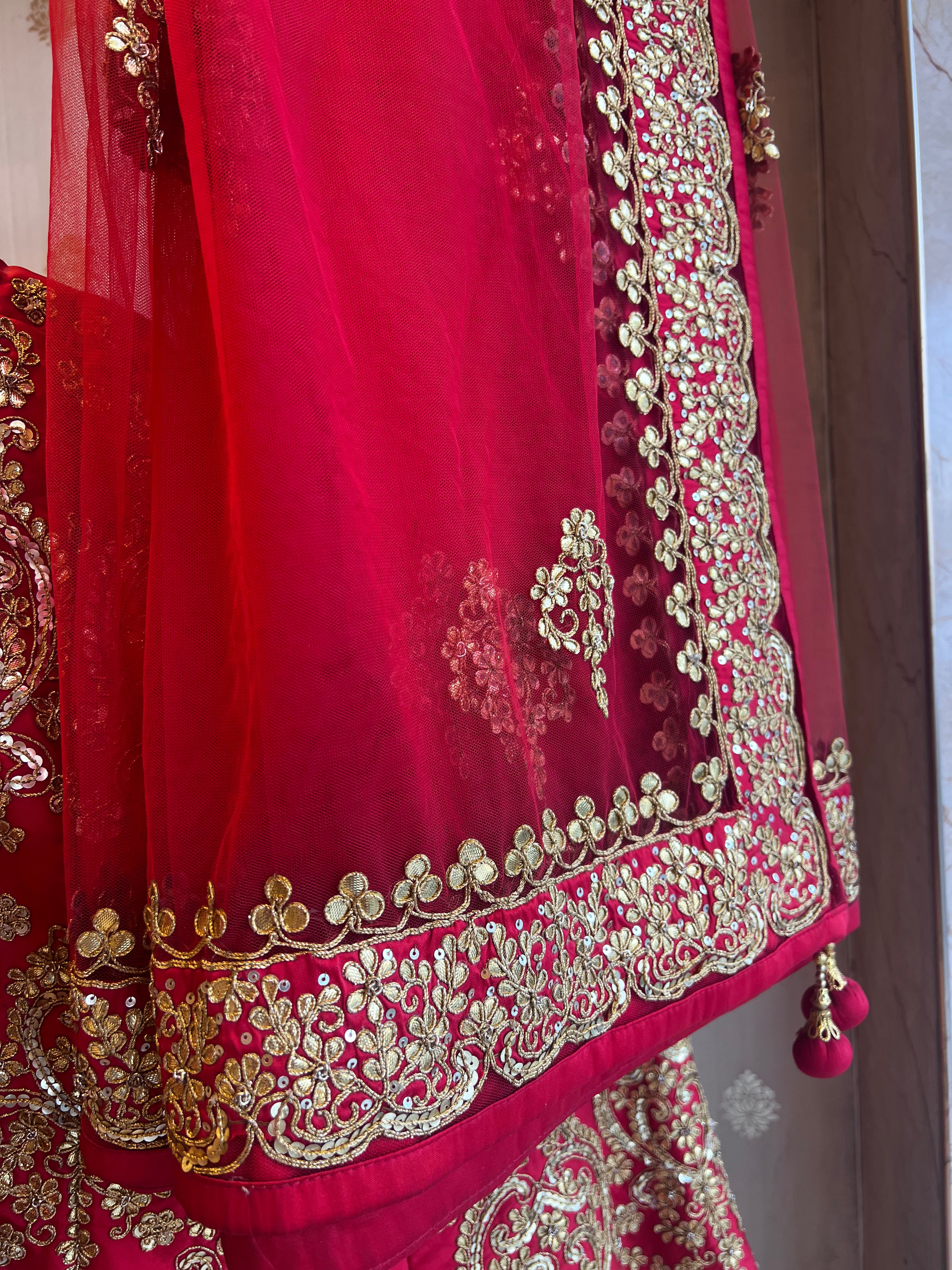 Red handwork gotapatti lehenga