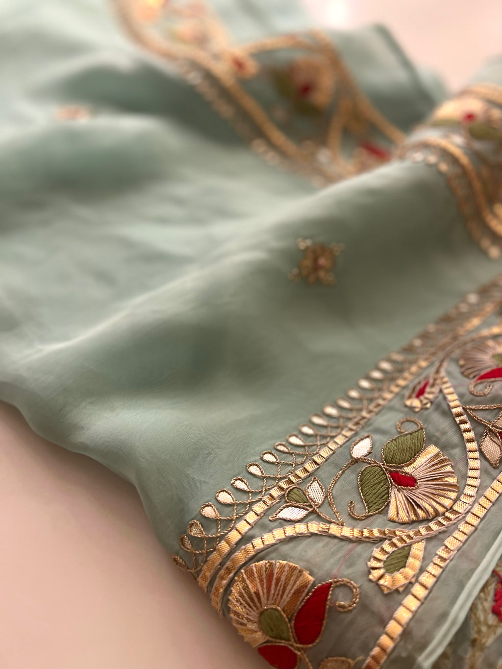 Traditional Gotapatti on organza Saree