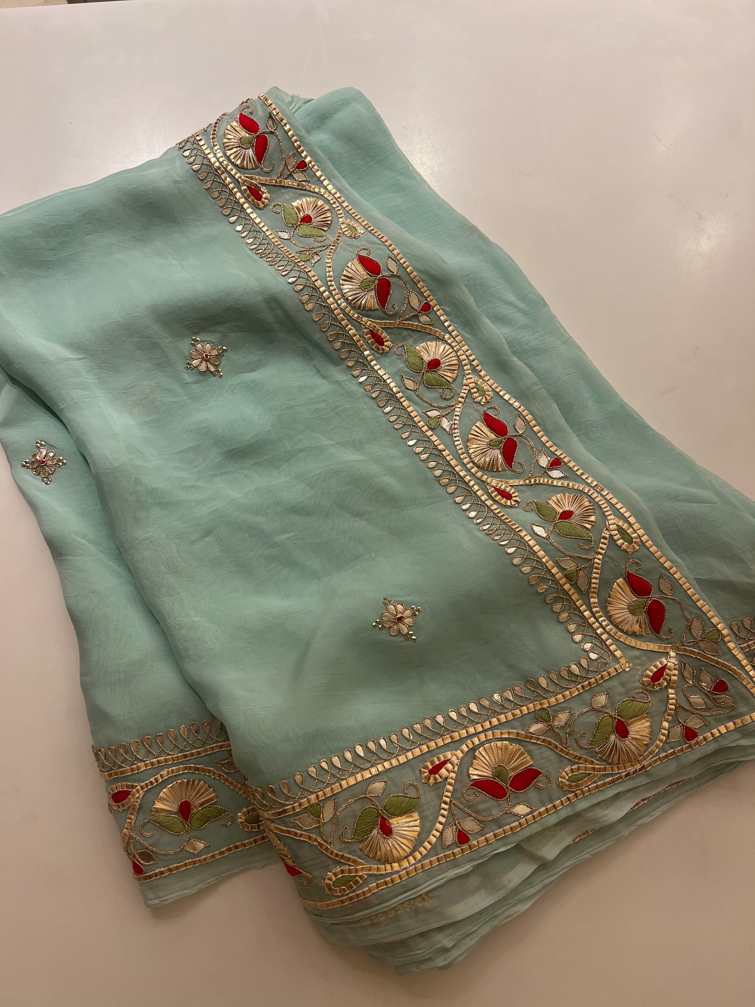 Traditional Gotapatti on organza Saree