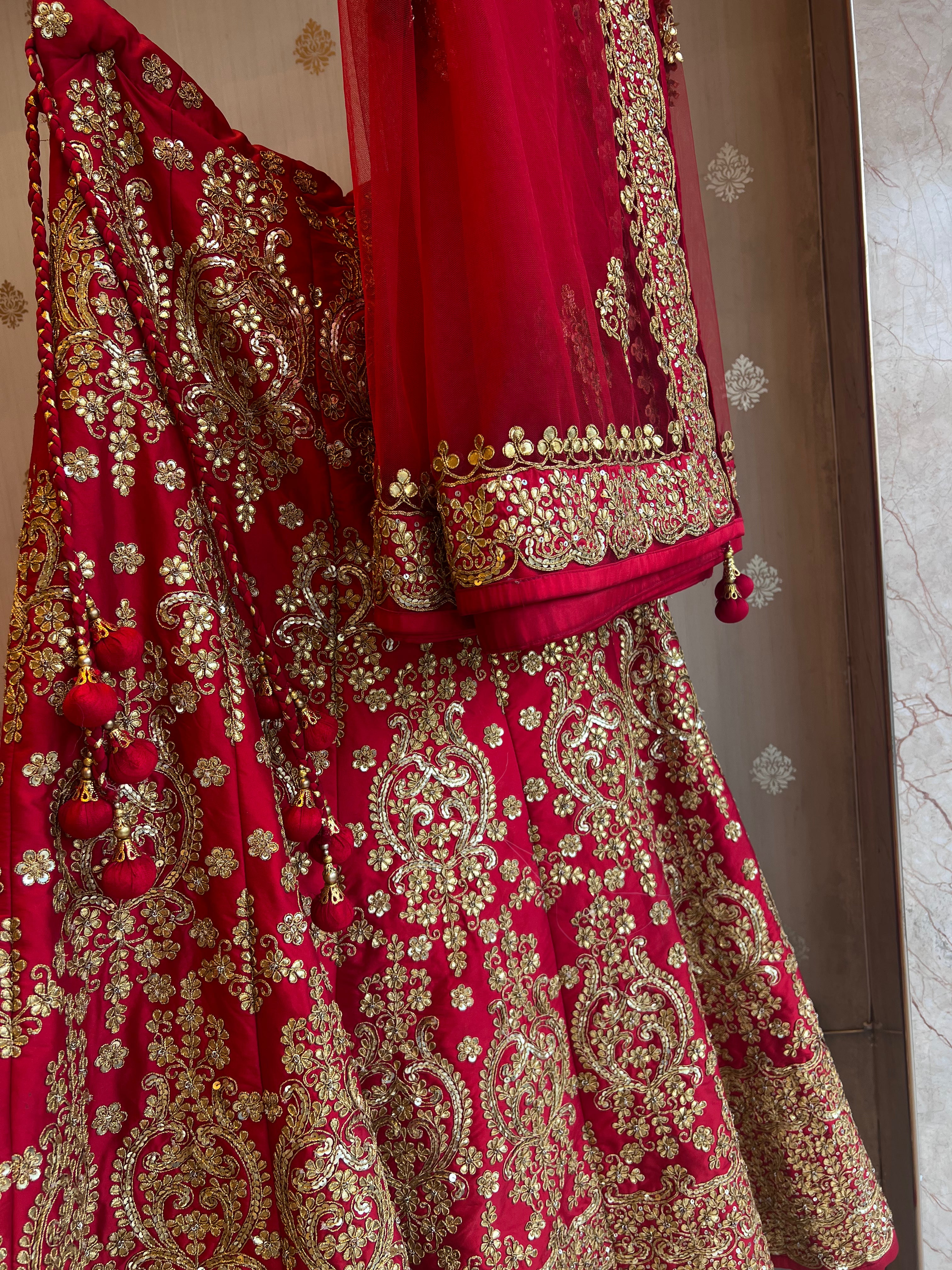 Red handwork gotapatti lehenga