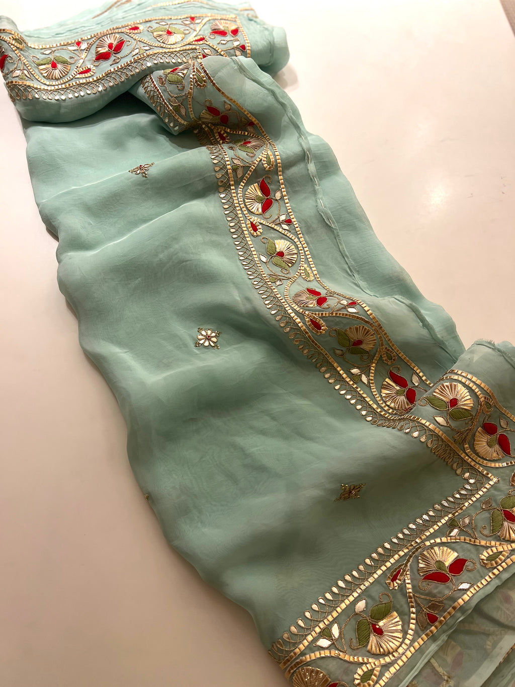 Traditional Gotapatti on organza Saree