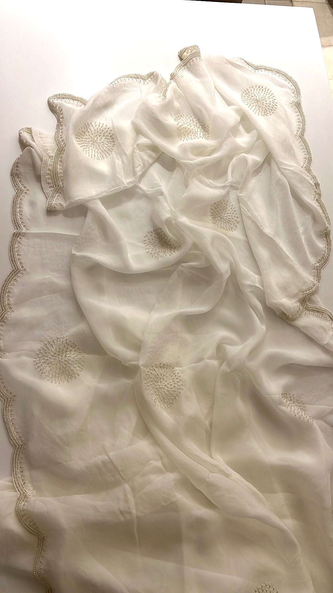 Ivory pearl organza saree