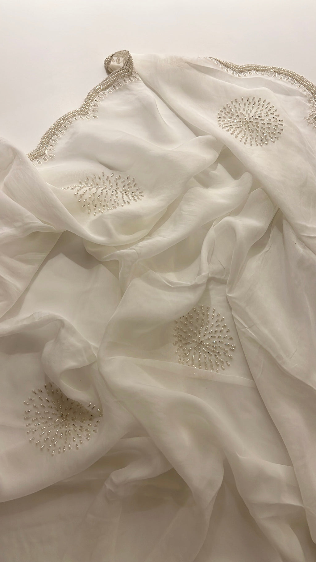 Ivory pearl organza saree