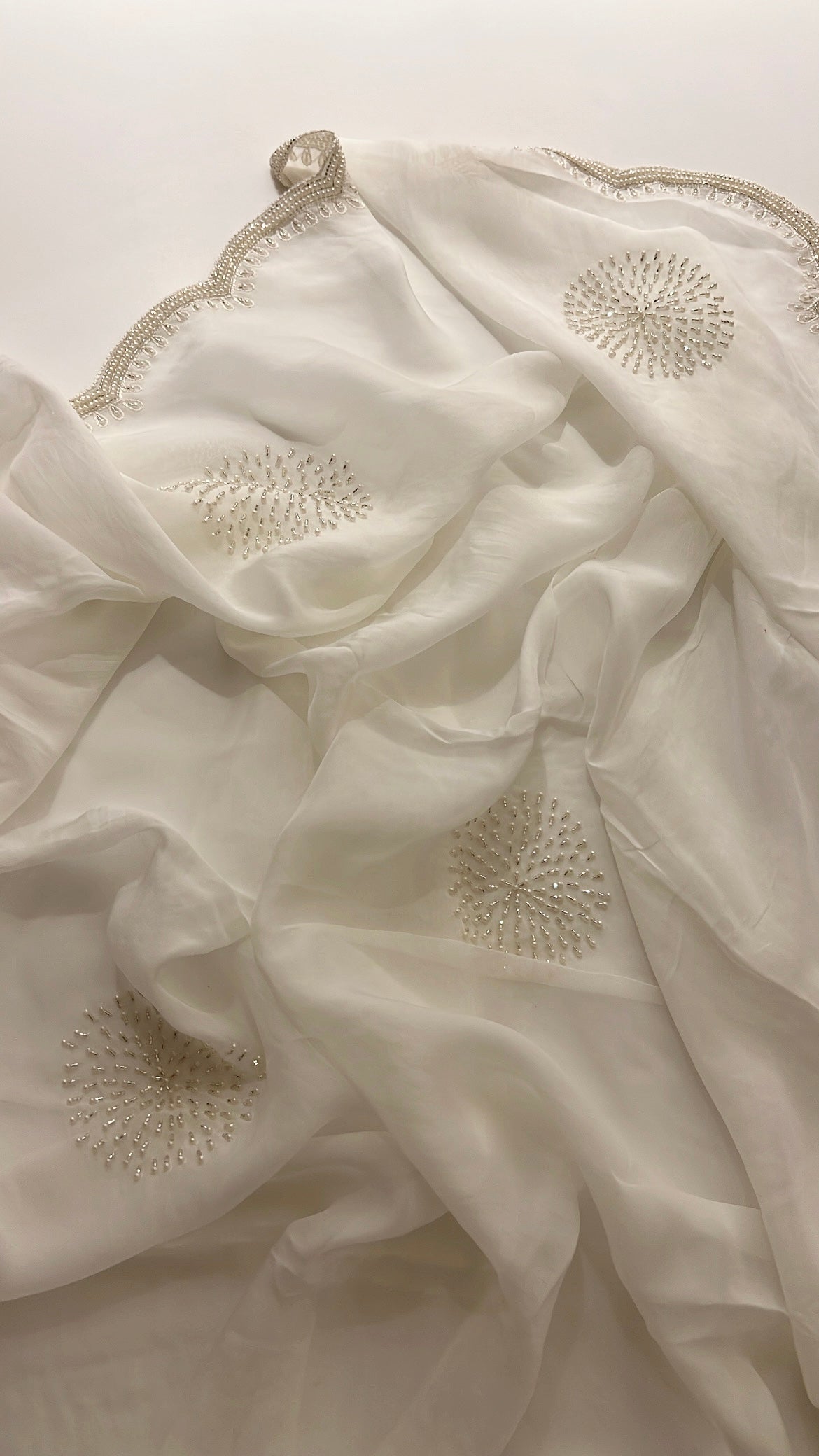 Ivory pearl organza saree
