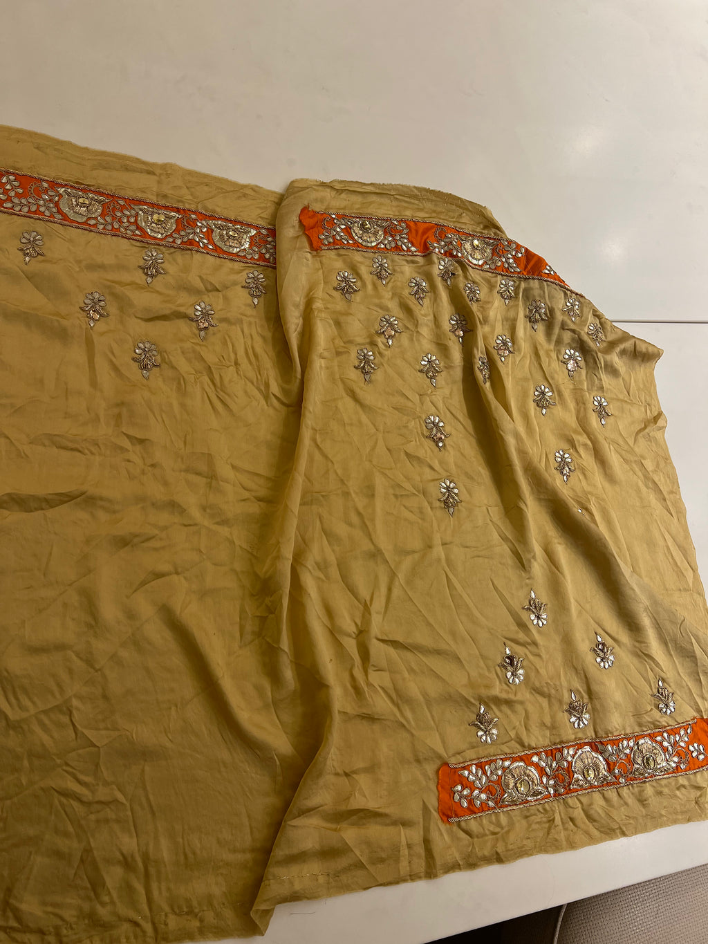 Rust orange fine handwork gotapatti lehenga set