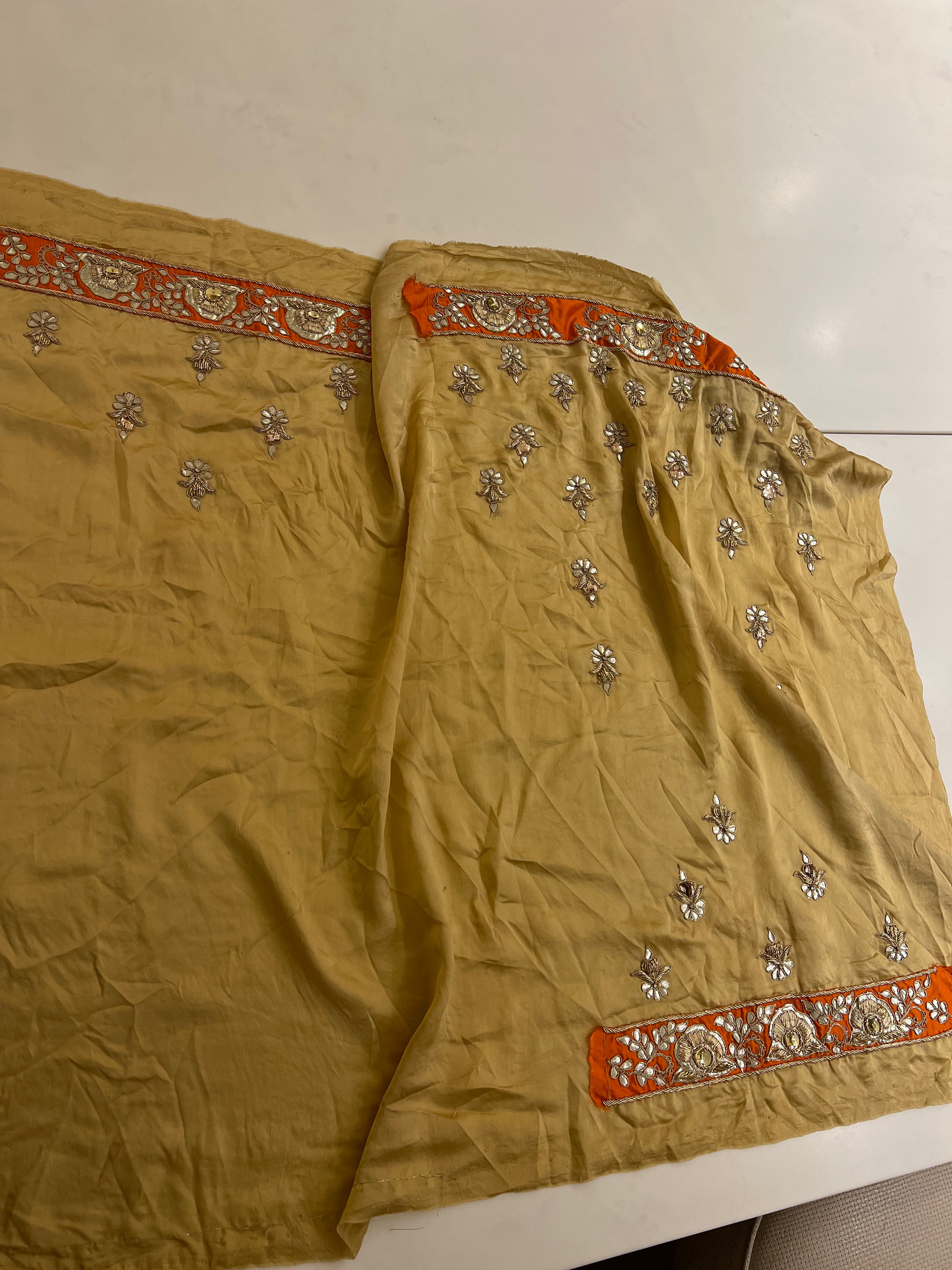 Rust orange fine handwork gotapatti lehenga set