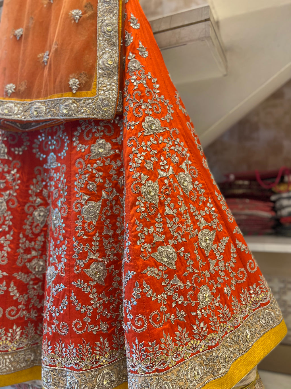 Rust orange fine handwork gotapatti lehenga set