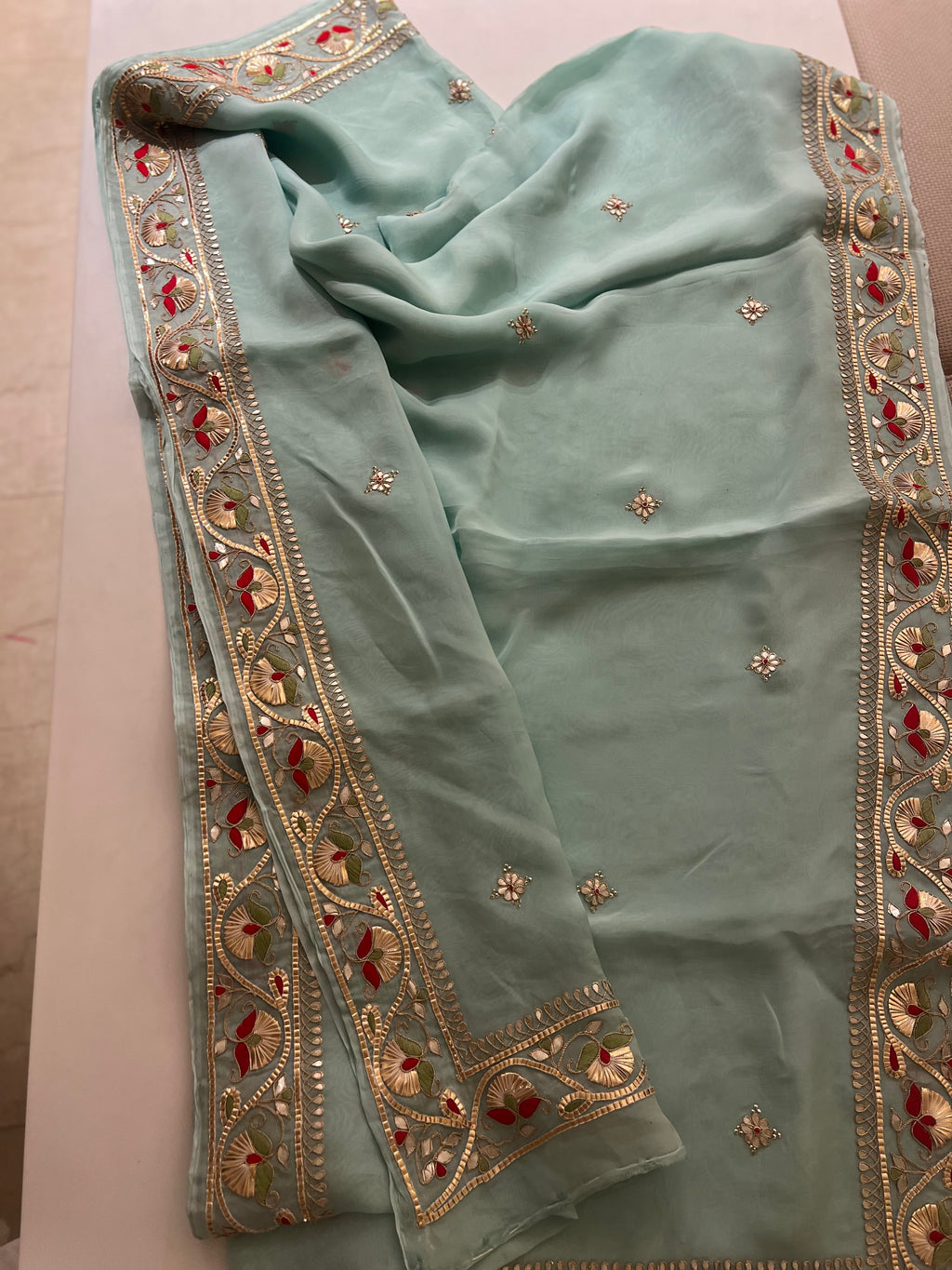 Traditional Gotapatti on organza Saree