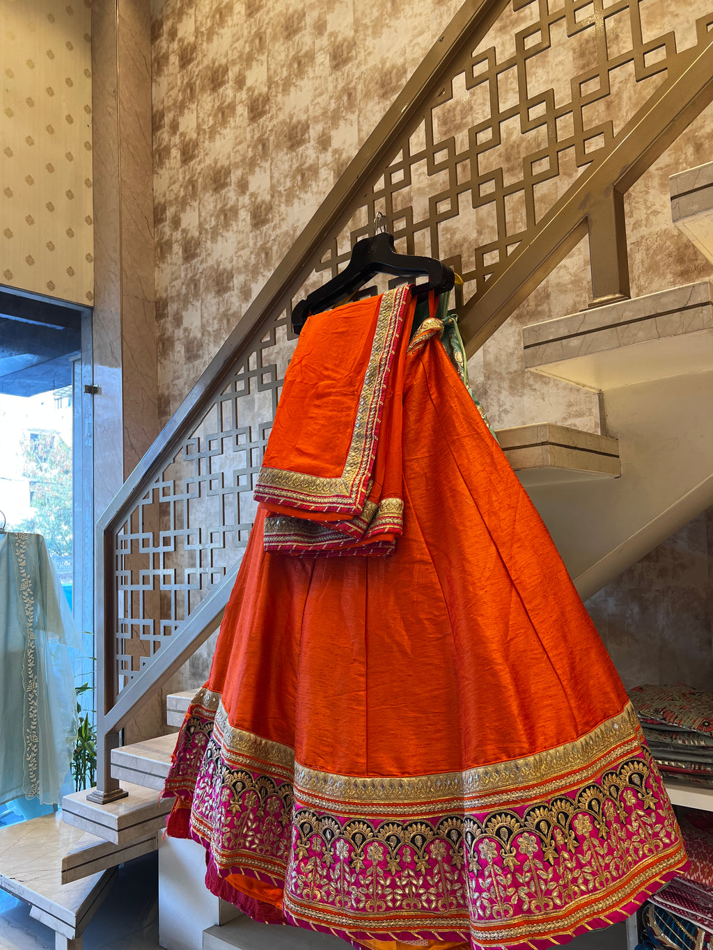 Tangerine raw silk lehenga