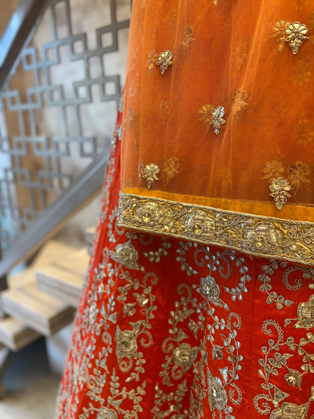 Rust orange fine handwork gotapatti lehenga set