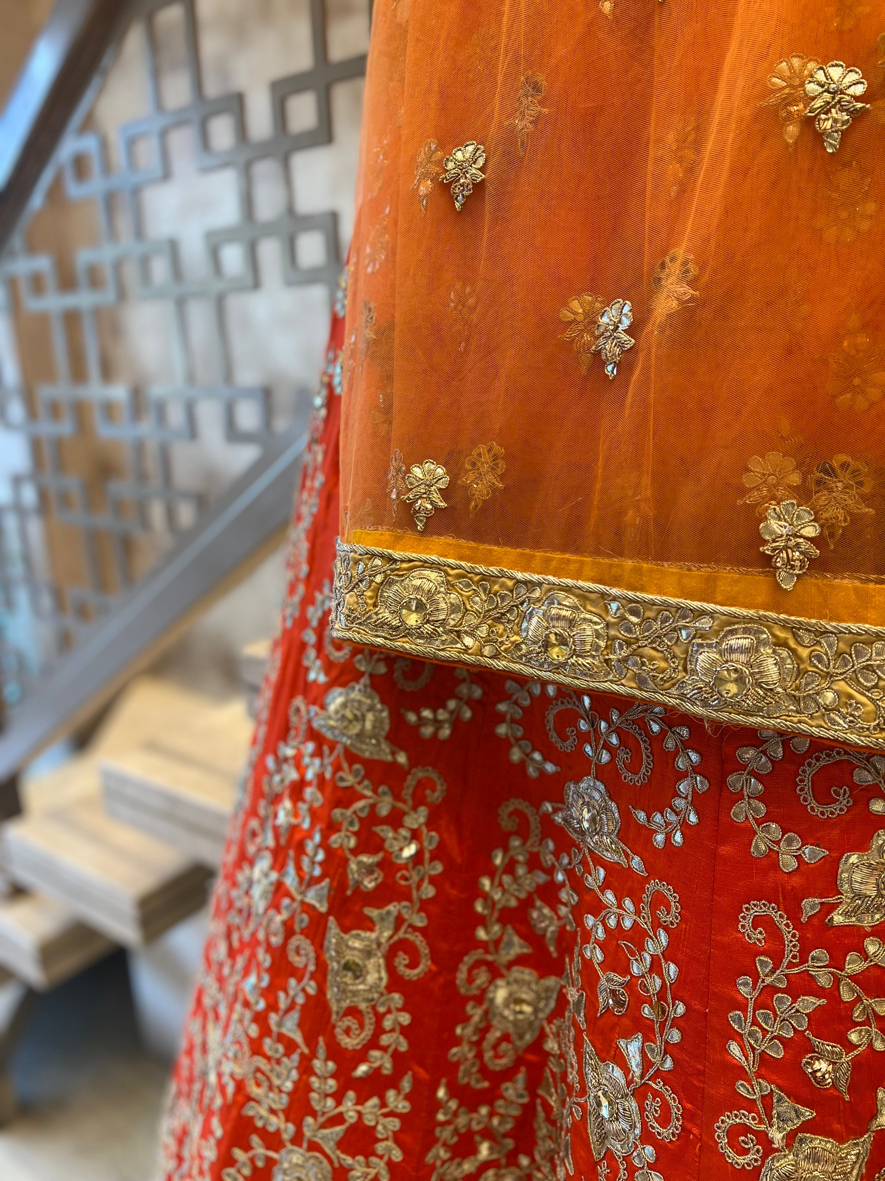 Rust orange fine handwork gotapatti lehenga set