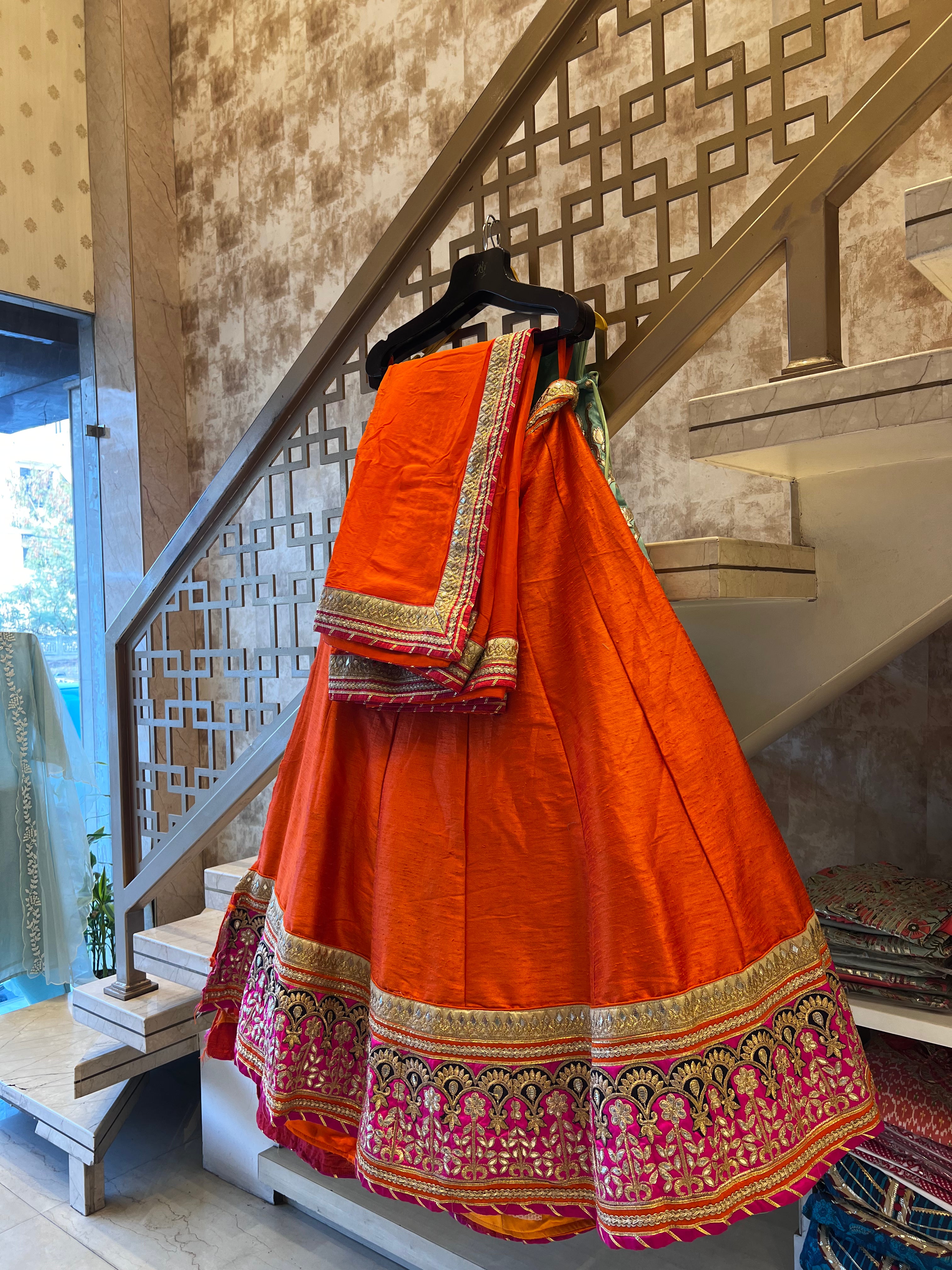 Tangerine raw silk lehenga